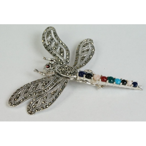 356 - A silver dragonfly brooch set with marcasites, sapphires, rubies etc