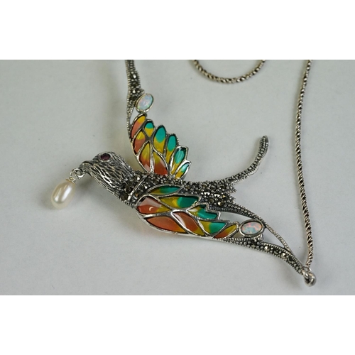 357 - A silver and plique-a-jour bird brooch with drop pearl