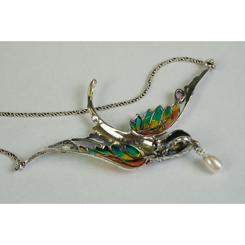 357 - A silver and plique-a-jour bird brooch with drop pearl