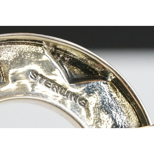 360 - A large silver horseshoe brooch