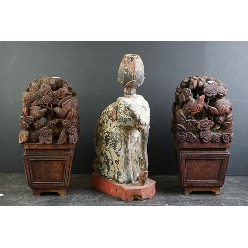 482 - Pair of South East Asian carved wooden flower displays, 32cm high, together with a painted carved wo... 