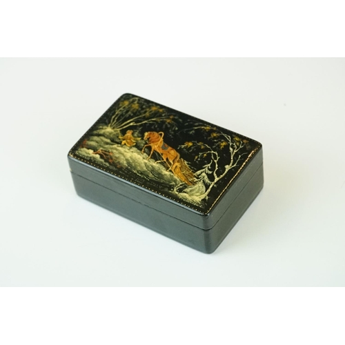 363 - A Russian lacquer box, signed Myahchhok (?), depicting a horse drawn sleigh, 9 x 6cm