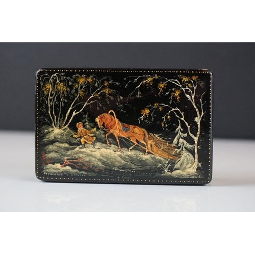 363 - A Russian lacquer box, signed Myahchhok (?), depicting a horse drawn sleigh, 9 x 6cm