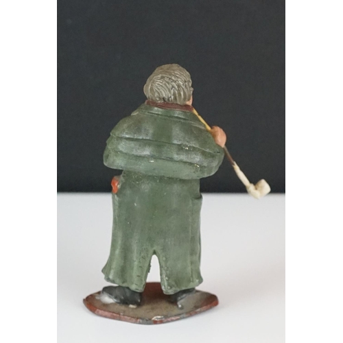 369 - A had painted lead figure in the form of Mr pickwick together with a carved wooden buddha.