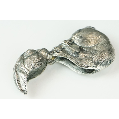 376 - A silver plated style vesta case, rabbit