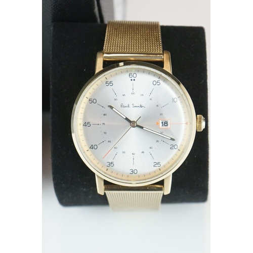 386 - Gents Paul Smith watch in original box with warranty card