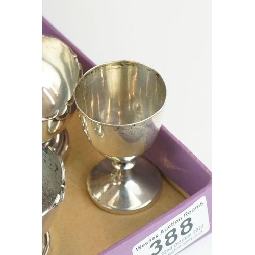 388 - A miniature silver goblet or chalice, Sheffield 1934, together with a group of silver condiments, 24... 