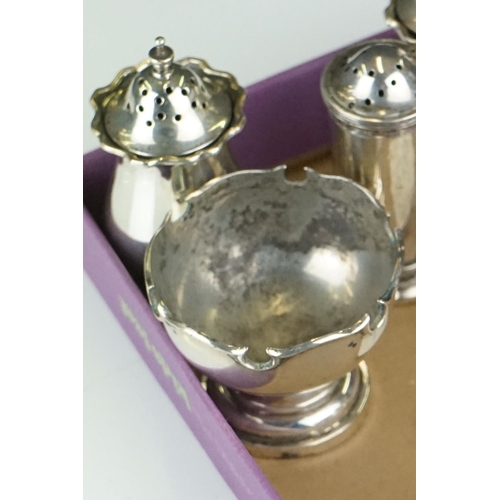 388 - A miniature silver goblet or chalice, Sheffield 1934, together with a group of silver condiments, 24... 