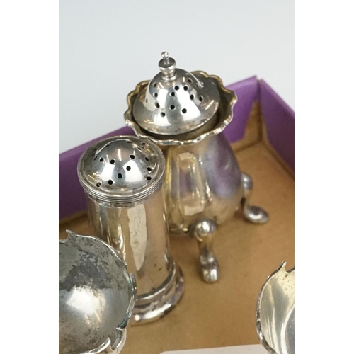 388 - A miniature silver goblet or chalice, Sheffield 1934, together with a group of silver condiments, 24... 