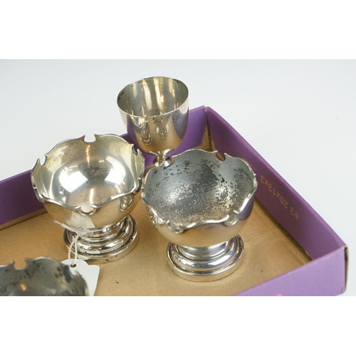 388 - A miniature silver goblet or chalice, Sheffield 1934, together with a group of silver condiments, 24... 