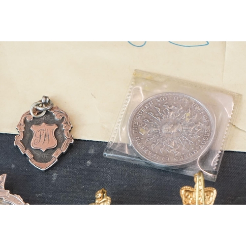 398 - A small group of collectables contained within a vintage case to include medals and hallmarked silve... 