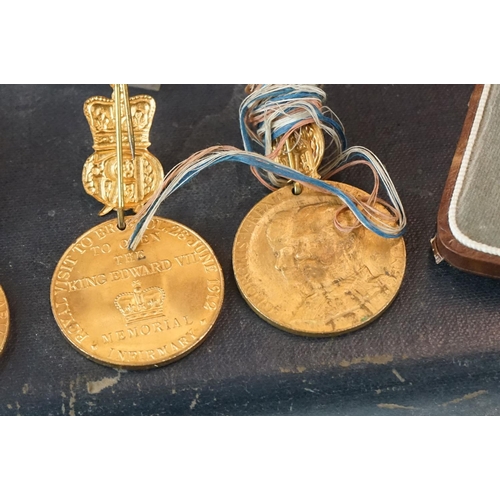 398 - A small group of collectables contained within a vintage case to include medals and hallmarked silve... 