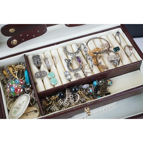 399 - A collection of vintage and contemporary costume jewellery to include gold and silver examples.