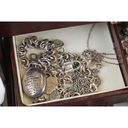 399 - A collection of vintage and contemporary costume jewellery to include gold and silver examples.