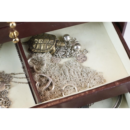 399 - A collection of vintage and contemporary costume jewellery to include gold and silver examples.