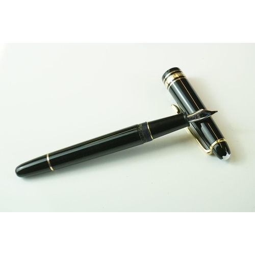 412 - A Mont Blanc ball point and fountain pen set together with official Mont Blanc two pen leather case.