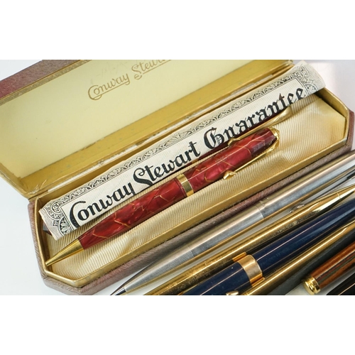 413 - A collection of mixed pens to include Conway Stewart, Sheaffer and Waterman examples.