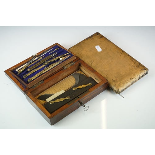 422 - Two early 20th century draughtsman's sets to include a wooden cased example.