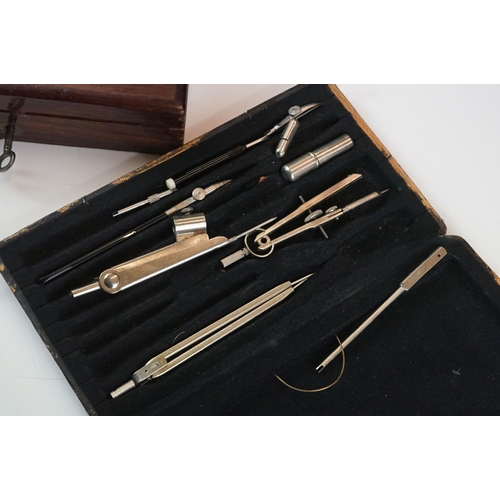 422 - Two early 20th century draughtsman's sets to include a wooden cased example.