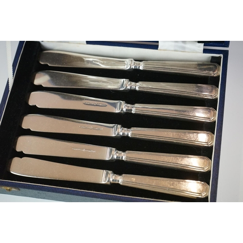 425 - A cased set of silver plated fish knives and forks.