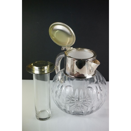 426 - A mid 20th century silver plated cut glass lemonade / cocktail cooling cooling jug together with a w... 