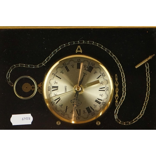 428 - A small group of mixed collectables to include watches, a framed cheque dated 1896, a clock and a co... 