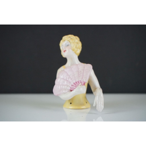 430 - A ceramic Art Deco style pin doll in the form of an Art Deco figure