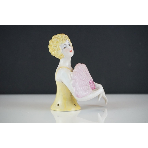 430 - A ceramic Art Deco style pin doll in the form of an Art Deco figure