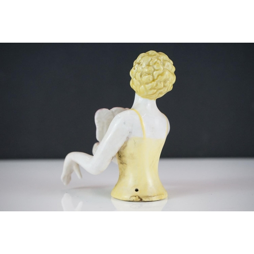 430 - A ceramic Art Deco style pin doll in the form of an Art Deco figure