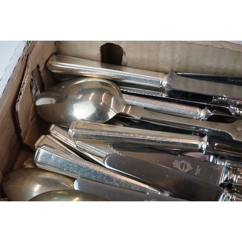 434 - A collection of silver plated cutlery to include spoons and butter knives.