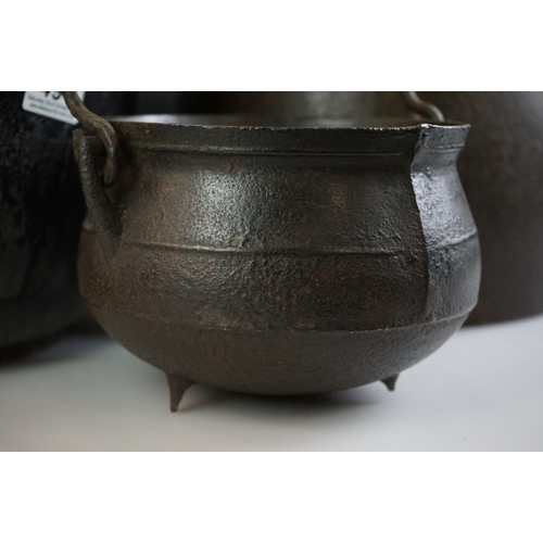 494 - 19th century Large Cast Iron Cooking Pot plus two others