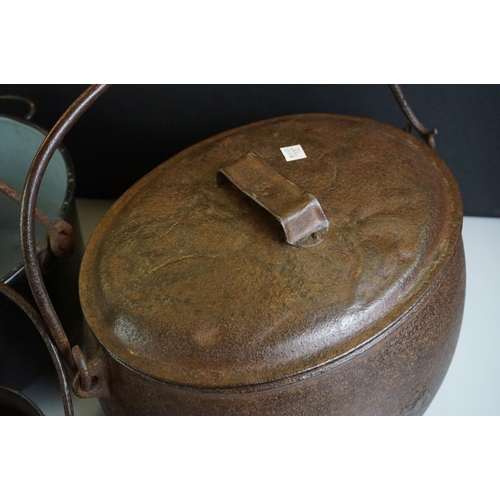 494 - 19th century Large Cast Iron Cooking Pot plus two others