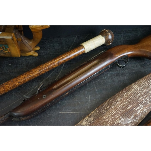 497 - Group of mixed collectables to include a hand carved Australian Aboriginal paring shield, 66cm long,... 