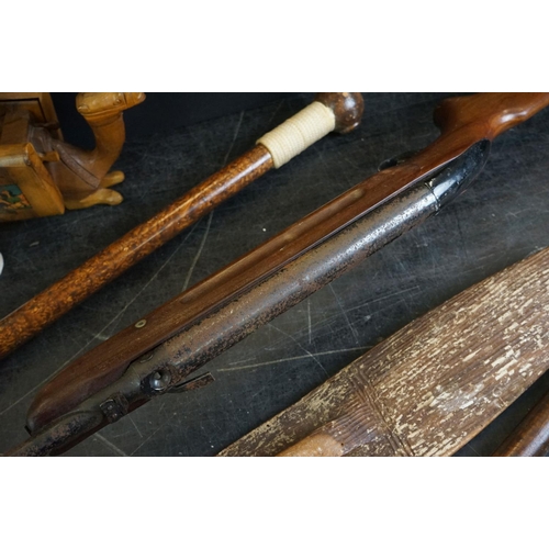 497 - Group of mixed collectables to include a hand carved Australian Aboriginal paring shield, 66cm long,... 