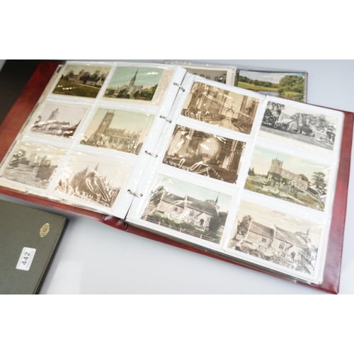 442 - Collection of postcards contained within two albums, spanning the 20th Century, mainly depicting bui... 