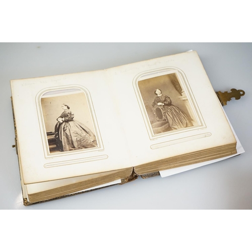 443 - Victorian Carte De Visite gilt photograph album, containing 30 photographs, together with a small co... 