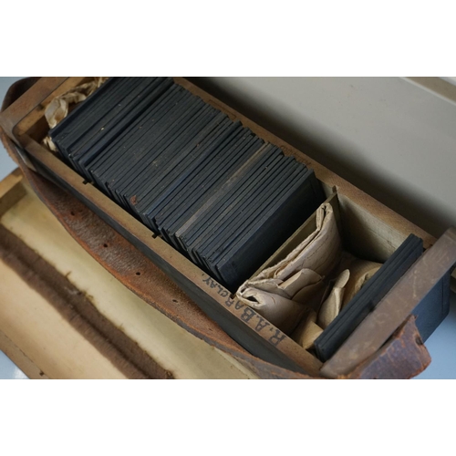 447 - Collection of magic lantern glass slides contained within various boxes, to include a quantity of Ti... 