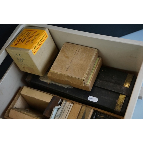 447 - Collection of magic lantern glass slides contained within various boxes, to include a quantity of Ti... 