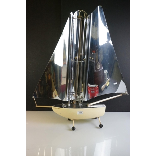 457 - Mid 20th Century heat lamp modelled as a yacht, with an aluminium sail and iron base, measures 78cm ... 