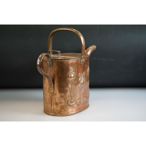 460 - Arts & Crafts Joseph Sankey & Sons copper watering can with embossed stylised floral decoration, siz... 