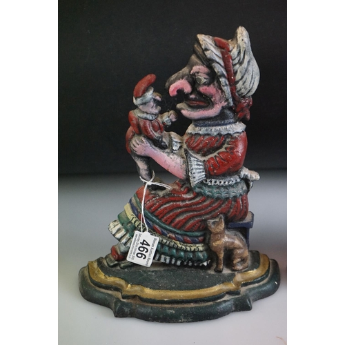 466 - Pair of cast iron Punch and Judy painted doorstops on stepped bases, measure 30cm and 27cm high resp... 