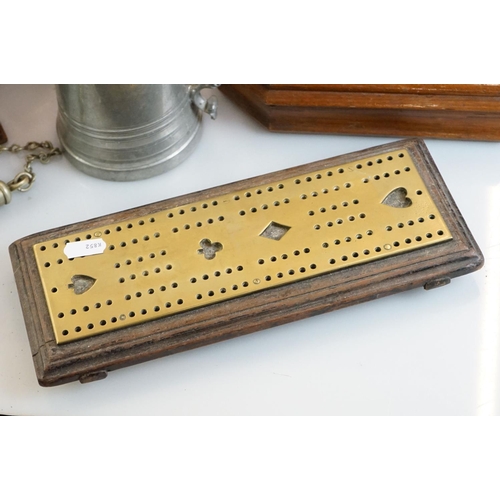 470 - A brass cribbage board, a treen brass bound rectangular box, a pewter tankard, a stell safe box, a p... 