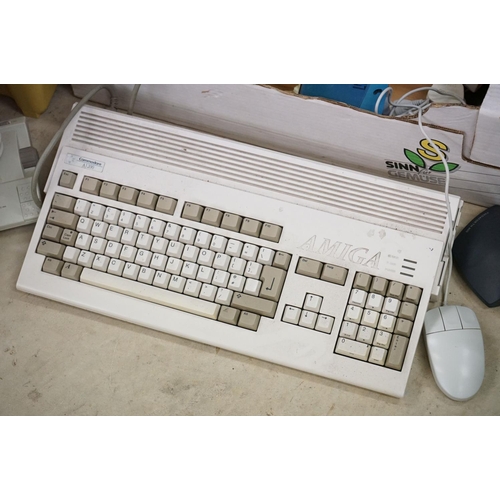 505 - Retro Gaming - Commodore Amiga A1200 with power supply, together with 3 Commodore manuals, spare Com... 