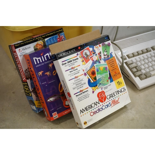 505 - Retro Gaming - Commodore Amiga A1200 with power supply, together with 3 Commodore manuals, spare Com... 