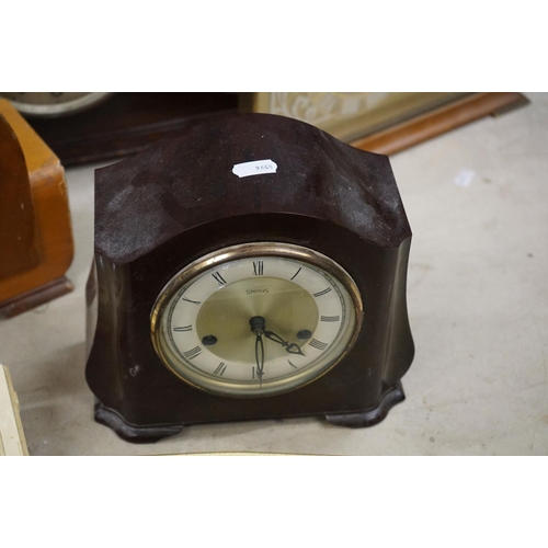 506 - Collection of 15 clocks, mostly wooden cased mantel clocks, to include a mid 20th century Smiths Bak... 