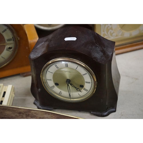 506 - Collection of 15 clocks, mostly wooden cased mantel clocks, to include a mid 20th century Smiths Bak... 