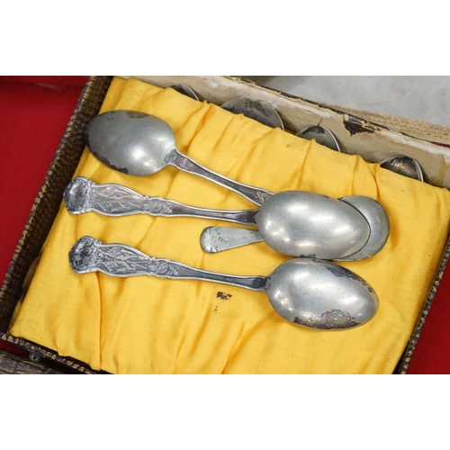 395 - A large collection of mainly silver plated collectors tea spoons contained within six wooden boxes.