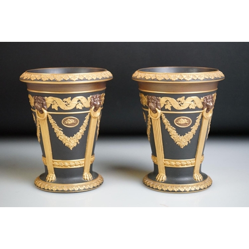 5A - Pair of Wedgwood Black Basalt Gilt tapering vases, decorated with relief floral decoration and brown... 