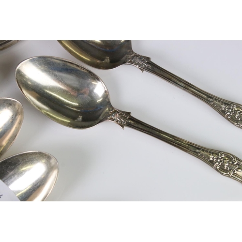 400A - A collection of fully hallmarked sterling silver to include hand mirror, brush, cruet set and table ... 