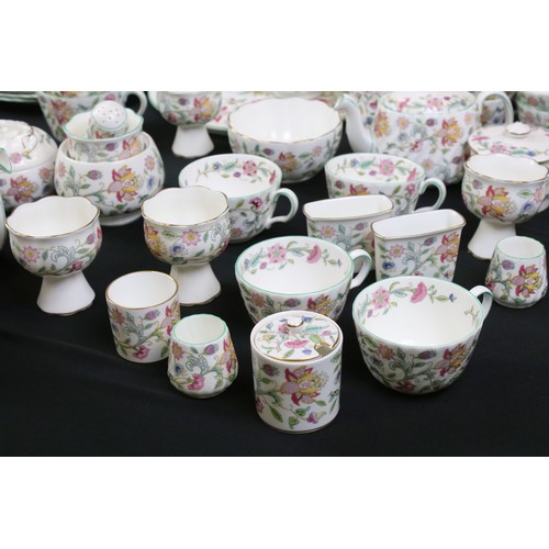 73 - Extensive collection of Minton ' Haddon Hall ' pattern ceramics, over 130 pieces, to include tea and... 